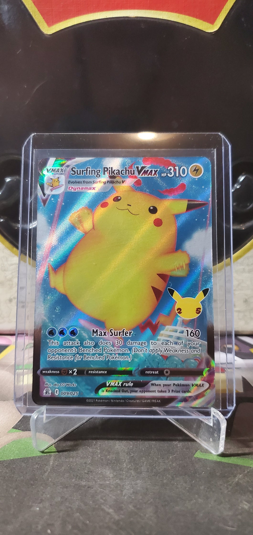 Surfing Pikachu VMAX - (009/025)